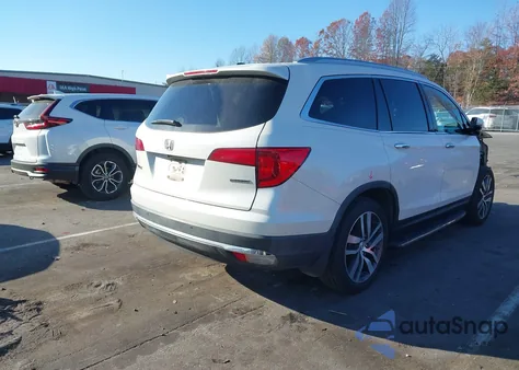 2016 Honda Pilot Touring из США, поврежденный, VIN 5FNYF5H97GB018976